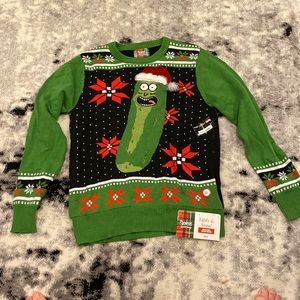 Pickle Rick Christmas sweater by Spencer’s